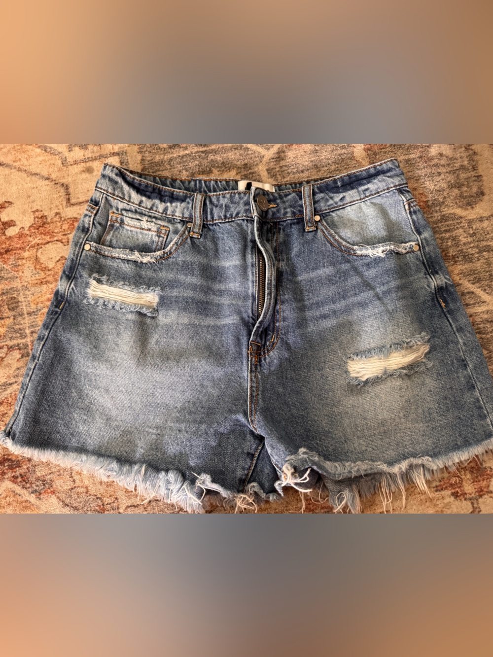 Women’s Distressed Light Blue Denim Jean Shorts